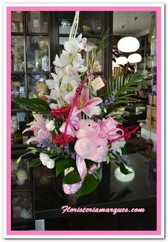 Centro de orquideas con peluche